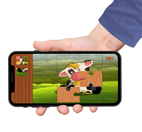 animal jigsaw puzzles featuring a cow puzzle on an iphone screen held by a hand with blue sleeves